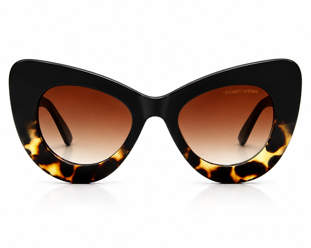 Consuelo oversized cat-eye sunglasses with black and tortoiseshell frame and gradient brown lenses, front view — Shady Views